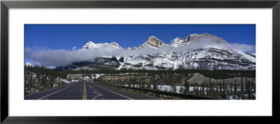 Road Leading To Snow Capped Mountains, Banff National Park, Alberta, Canada by Panoramic Images Pricing Limited Edition Print image