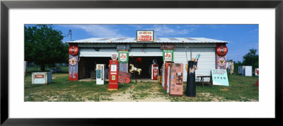 Vintage Signs On Garage, Texas, Usa by Panoramic Images Pricing Limited Edition Print image