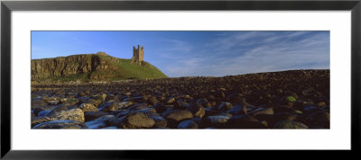 Castle In A Landscape, Dunstanburgh Castle, Northumberland, England, United Kingdom by Panoramic Images Pricing Limited Edition Print image