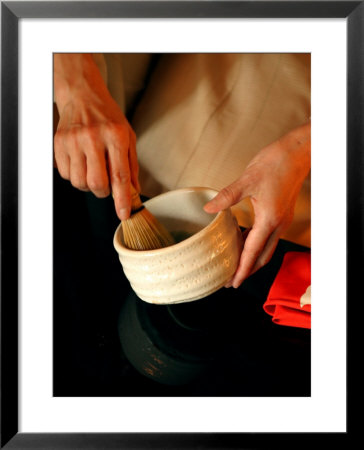 Woman Whisking Tea For Ceremony At Okura Hotel, Tokyo, Kanto, Japan by Greg Elms Pricing Limited Edition Print image