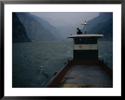 Man Changes A Lightbulb On A Barge Near The Three Gorges by Eightfish Pricing Limited Edition Print image