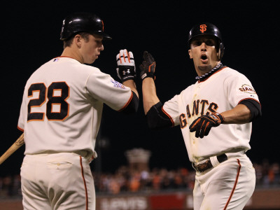 Texas Rangers V San Francisco Giants, Game 1: Andres Torres, Buster Posey by Ezra Shaw Pricing Limited Edition Print image