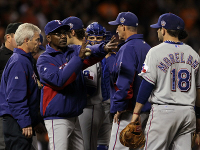 Texas Rangers V San Francisco Giants, Game 2: Ron Washington, Mitch Moreland by Justin Sullivan Pricing Limited Edition Print image