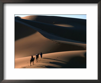 Camel Caravan Crossing The Erg Chebbi Dunes Of Merzouga, Erg Chebbi Desert, Morocco by John Elk Iii Pricing Limited Edition Print image
