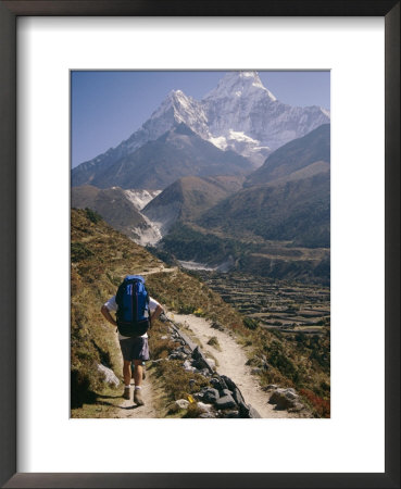A Hiker Treks Toward Mount Ama Dablam by Michael Klesius Pricing Limited Edition Print image
