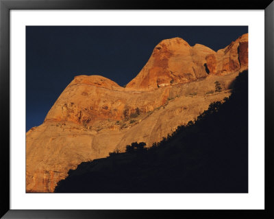 Sunlight Shines On Rock Formations Surrounding The Colorado River by Melissa Farlow Pricing Limited Edition Print image