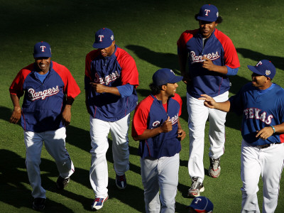 Texas Rangers V. San Francisco Giants, Game 5:  The Texas Rangers Warm Up Before Game Five by Christian Petersen Pricing Limited Edition Print image