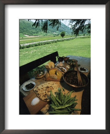 Table Spread With A Typical Umbrian Feast Of Bread And Lamb Innards by O. Louis Mazzatenta Pricing Limited Edition Print image