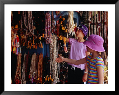 Girls Shopping For Glass Bead Necklaces At Indra Chowk, Kathmandu, Nepal by Richard I'anson Pricing Limited Edition Print image