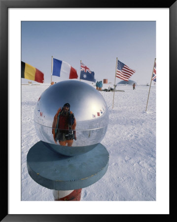 Flags Of Many Nations And A Ceremonial Globe At The South Pole by Gordon Wiltsie Pricing Limited Edition Print image