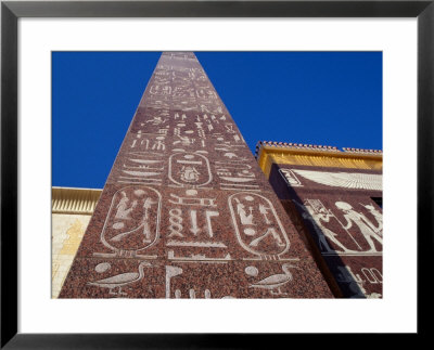 Hieroglyphics On Facade Of Pyramid Restaurant In Wafi Centre, Dubai, United Arab Emirates by Tony Wheeler Pricing Limited Edition Print image