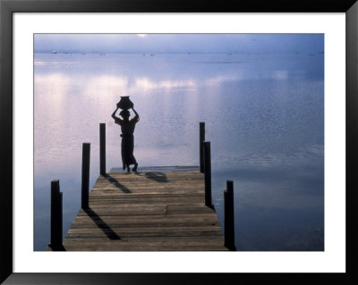 A Girl Balances A Water Jar, Myanmar by Keren Su Pricing Limited Edition Print image