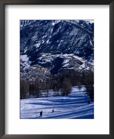People Skiing Towards Town, Briancon, France by Richard Nebesky Pricing Limited Edition Print image