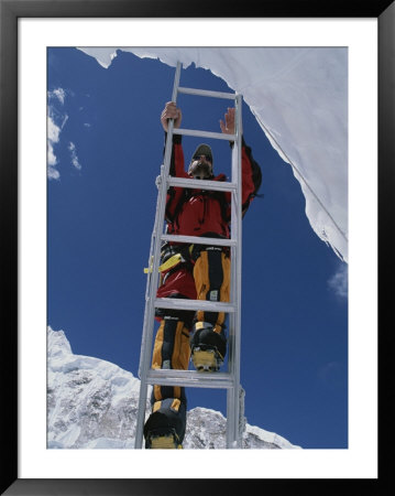 Chris Binggeli Climbs A Ladder In The Khumbu Icefall by Bobby Model Pricing Limited Edition Print image