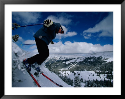A Skier Commences His Journey Down The Steep Slopes Of The Mountain Range by Barry Tessman Pricing Limited Edition Print image