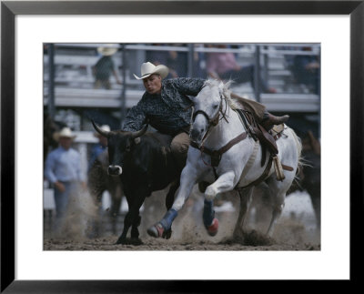 A Cowboy Drops Off His Horse To Wrestle A Steer by Bobby Model Pricing Limited Edition Print image