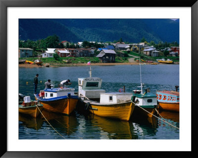 Fishing Boats Moored In Town Harbour, Puerto Cisnes, Chile by Brent Winebrenner Pricing Limited Edition Print image