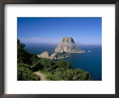 The Rocky Islet Of Es Vedra Surrounded By Mist, Near Sant Antoni, Balearic Islands by Marco Simoni Pricing Limited Edition Print image