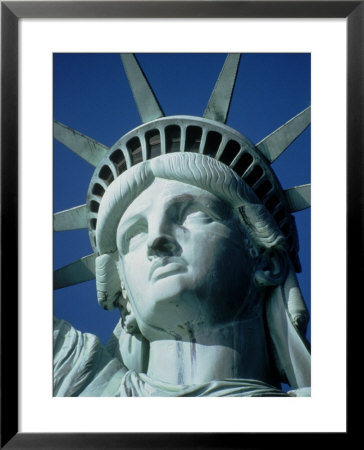 The Statue Of Liberty Against A Cityscape In Smog by Michael Howell Pricing Limited Edition Print image