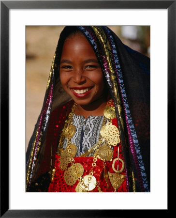 Girl In Traditional Dress At Sahara Festival, Looking At Camera, Douz, Tunisia by Craig Pershouse Pricing Limited Edition Print image