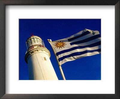 Faro Del Cabo De Santa Maria Lighthouse And Uruguayan Flag, La Paloma, Rocha, Uruguay by Krzysztof Dydynski Pricing Limited Edition Print image