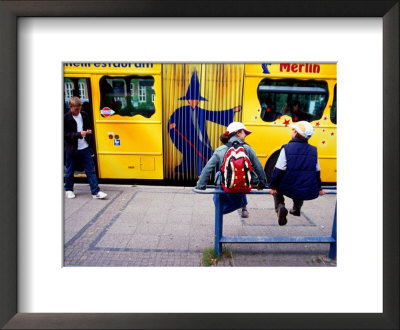 Children Waiting For Bus At Holstentorplatz, Lubeck, Schleswig-Holstein, Germany by Martin Llado Pricing Limited Edition Print image