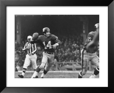 Ny Giants Quarterback Y.A. Tittle In A Football Game Against The Dallas Cowboys by Ralph Morse Pricing Limited Edition Print image