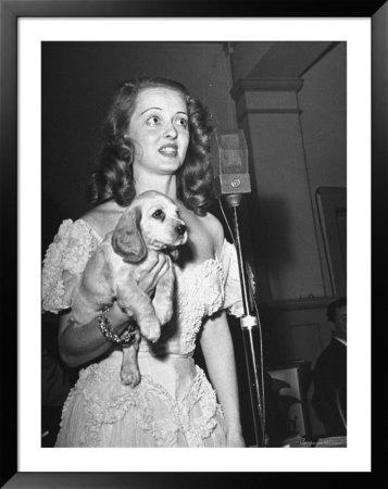 Actress Bette Davis Holding Puppy Raffled Off During Her Tailwaggers Party To Benefit Stray Dogs by Rex Hardy Jr. Pricing Limited Edition Print image