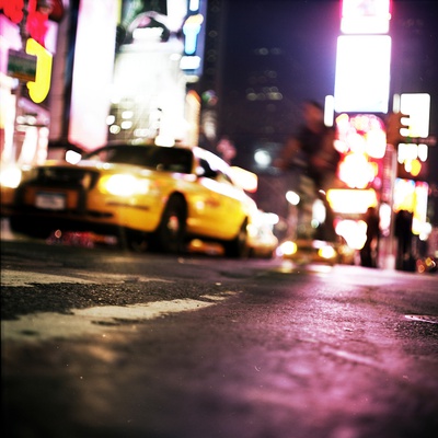 A Yellow Cab At Night In New York by Jewgeni Roppel Pricing Limited Edition Print image