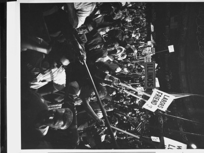 Delegates Crowd On Convention Floor, Waving Signs During Sessions Of Progressive Party Convention by Gjon Mili Pricing Limited Edition Print image