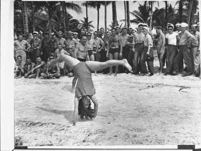 Barefoot Acrobat Joyce Breazell Doing A Panty-Revealing Split During Visit Of Uso Camp Show Tour by Peter Stackpole Pricing Limited Edition Print image