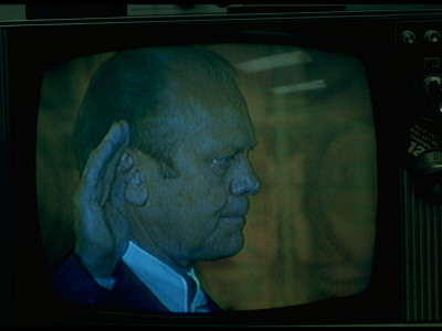 Close Tv Image Of Vp Gerald R. Ford With Hand Raised As He Takes Oath Of Office As 38Th Us Pres by Gjon Mili Pricing Limited Edition Print image
