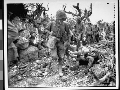 Us Marines Passing Through Small Village Where Japanese Soldiers Lay Dead, Ryukyu Islands, Wwii by Norris G. Mcelroy Pricing Limited Edition Print image