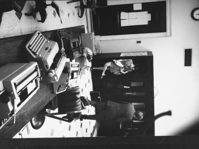 Nearly Deserted Press Room With Table Lined With Typewriters; During Senate Watergate Hearings by Gjon Mili Pricing Limited Edition Print image