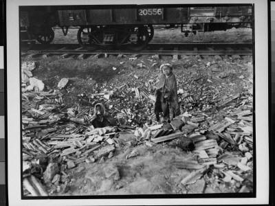 Homeless Sibblings Rummaging For Food And Try To Keep Warm In Railroad Yards, During Korean War by Private Fulton Pricing Limited Edition Print image