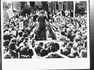 Senator Robert Kennedy On Back Of Convertible Car, Surrounded By A Sea Of Outstretched Hands by Bill Eppridge Pricing Limited Edition Print image