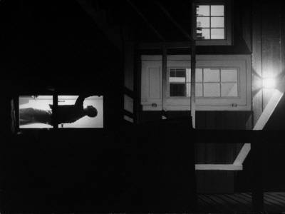 Dancer Jose Limon Silhouetted At Evening In Doorway Of His Home by Gjon Mili Pricing Limited Edition Print image