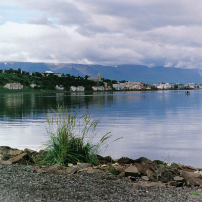 Looking Across The Sea At The Capital Of North Iceland, Akureyri by Jon Pall Vilhelmsson Pricing Limited Edition Print image