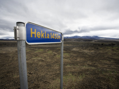 A Sign Indicating The Distance To Mt Hekla, Iceland by Atli Mar Pricing Limited Edition Print image
