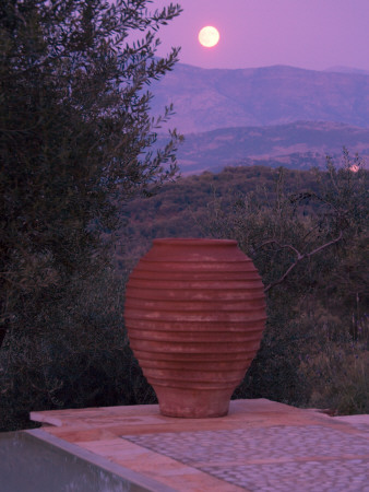 Dusk View Across Swimming Pool Towards Terracotta Urn With Full Moon, Corfu, Designer: Gina Price by Clive Nichols Pricing Limited Edition Print image