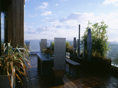 Roof Terrace - Iroko Decking, Zinc-Wrapped Table, Stainless Steel Throne Chairs, Steel Sculpture by Clive Nichols Pricing Limited Edition Print image