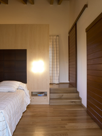 House In La Cerdanya, Girona, Bedroom With Closed Sliding Door, Architect: Carles Gelp?I Arroyo by Eugeni Pons Pricing Limited Edition Print image