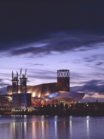 Lowry Arts Centre, Salford Quays, Manchester, Exterior At Dusk With Reflection Of Light In Water by Richard Bryant Pricing Limited Edition Print image