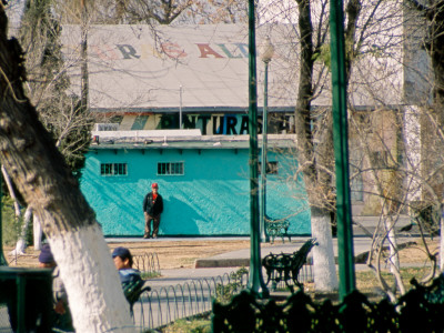 Man Against The Turquoise Wall, Juarez by Eloise Patrick Pricing Limited Edition Print image