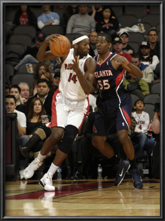 Atlanta Hawks V Toronto Raptors: Julian Wright And Jordan Crawford by Ron Turenne Pricing Limited Edition Print image