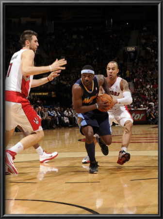 Denver Nuggets V Toronto Raptors: Ty Lawson And Jerryd Bayless by Ron Turenne Pricing Limited Edition Print image