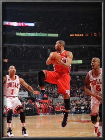 Los Angeles Clippers V Chicago Bulls: Eric Gordon, Derrick Rose And Keith Bogans by Randy Belice Pricing Limited Edition Print image
