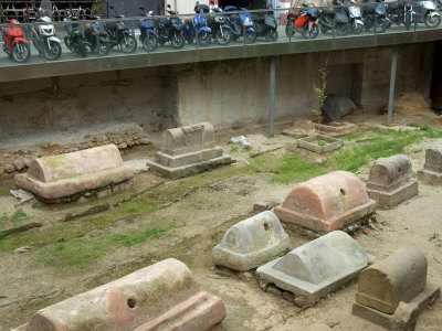 Roman Tombs And Motorcycles Share An Open Plaza In Barcelona by Stephen Sharnoff Pricing Limited Edition Print image