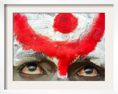 Sadhu, Or Hindu Holy Man, Looks On During The Annual Cattle Fair, Pushkar, India, November 3, 2006 by Rajesh Kumar Singh Pricing Limited Edition Print image