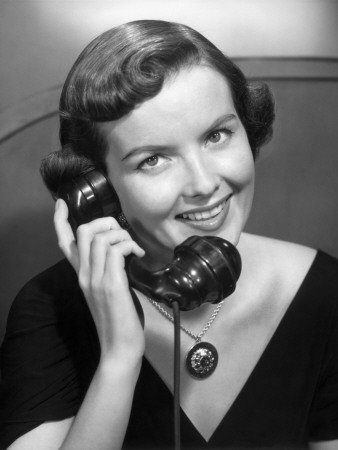 Smiling Young Woman On Telephone by George Marks Pricing Limited Edition Print image